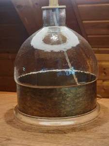 lot 34 image: Wide Metal Banded Glass Vesssel Table Lamp