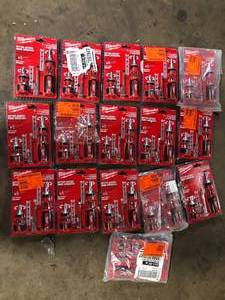 lot 9 image: Lot of Milwaukee 9-in-1 Ratcheting Multi-Bit Screwdriver with 8-in-1 Compact Ratcheting Multi-Bit Screwdriver and 6-in-1 Wire Pliers  Customer Returns See Pictures