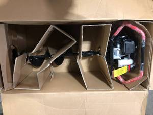lot 21 image: Toro 1-Person or 2-Person 52 cc 2-Cycle Earth Auger Powerhead with 8 in. Auger Bit  Customer Returns See Pictures