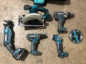 lot 23 image: Makita 18V LXT Lithium-Ion Cordless 5-pc. Combo Kit (Drill-DriverImpact DriverCircular Saw Recipro SawLight) one  4.0Ah batterry   Customer Returns See Pictures