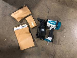 lot 53 image: Makita 1-34 in. 15° Roofing Coil Nailer Customer Returns See Pictures