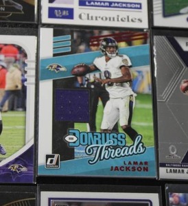 lot 69 image: Lamar Jackson Football Card Lot  20 Cards w 2019 Donruss Threads Jersey Relic
