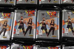 lot 102 image: 2022 WWE NXT 2.0 Unopened Pack Lot  12 Packs