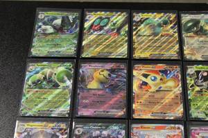 lot 105 image: Pokemon Scarlet & Violet EX Hit Lot  20 EX Cards