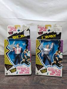 lot 63 image: Two Packs Of New Kids On The Block Figures