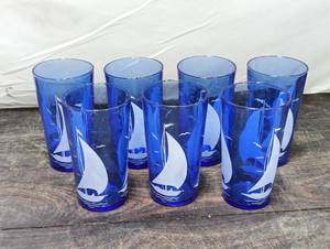 lot 102 image: Set Of Seven Blue Glass Sailboat Glasses