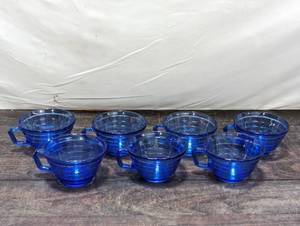 lot 103 image: Set Of Seven Blue Glass Teacups