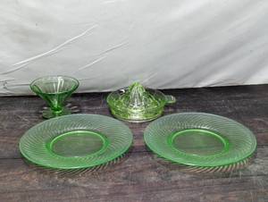 lot 107 image: Four Uranium Glass Pieces