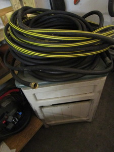 lot 42 image: Garden Hose & Storage Box