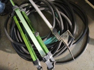lot 63 image: Garden Hoses & Sprinklers