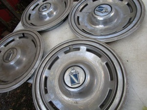 lot 193 image: Buick Hubcaps