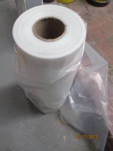 Roll of Plastic Sheeting  3 Buckets of Sure Seal Bonding Adhesive