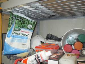 Shelf of Spray paint, screws, 2 full and 2.partial gallon jugs of Polyurethane and more