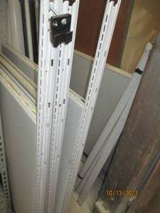 Complete cubicle system in 2 piles, on set of panels is taller than the other