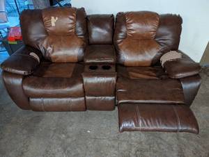 Used Leather Reclining Love Seat - Some leather damage see picture
