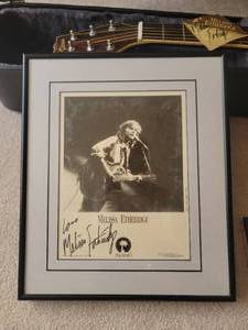 lot 16 image: Signed Melissa Etheridge Dixon DG20 Acoustic Guitar & Photograph