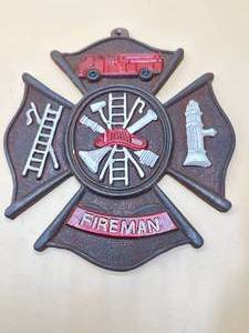 Cast Iron Fireman Plaque 9 Inches Long