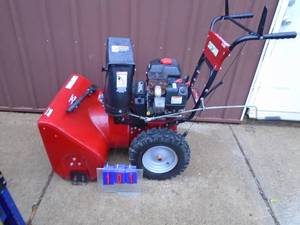 lot 101 image: Craftsman 8.5 hp 27 snow thrower with electric start. Looks nearly new. Tested & works. As shown.
