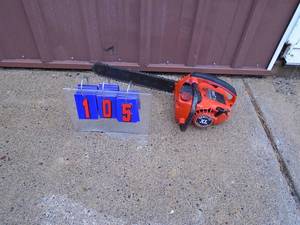 lot 105 image: Home Lite XL chainsaw. Used condition. Tested & works. As shown.