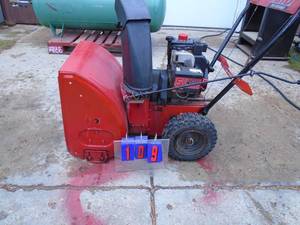 lot 109 image: MTD snow blower. Used condition. 5 hp 22 Tested & works. As shown.