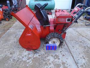 lot 111 image: Toro 11 hp 32 snow blower. Used condition. Tested & works. As shown. Bring a trailer & help as this is a heavy duty unit.