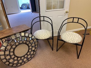 Pair of black metal chairs, side ta...