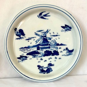 Seven Delft Plates, Trivets and Bowls