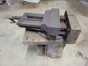 17 Machinist Vise, Attached to 23 x 18 x 2 Steel Plate which is attached to a cast Iron Engine Block