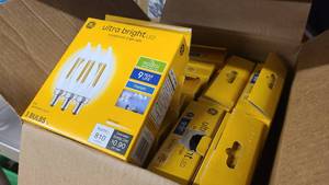 Multiple boxes of Ultra Bright LED Candelabra base bulbs
