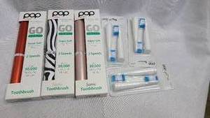 3 pack of New POP Sonic portable electric toothbrushes with 3 replacement heads