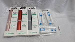 3 pack of New POP Sonic portable electric toothbrushes with 3 replacement heads