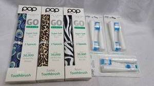 3 pack of New POP Sonic portable electric toothbrushes with 3 replacement heads