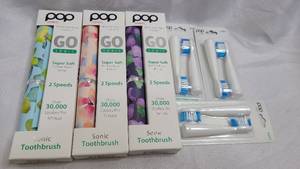 3 pack of New POP Sonic portable electric toothbrushes with 3 replacement heads