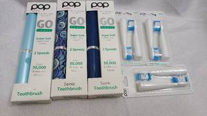 3 pack of New POP Sonic portable electric toothbrushes with 3 replacement heads