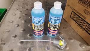 2 Bottles and 1 sprayer of Melt-It De-icer spray