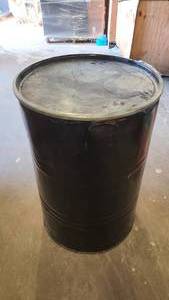 Empty black resealable barrel