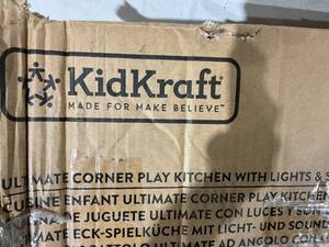 lot 110 image: KidKraft White Ultimate Corner Wooden Play Kitchen with Lights & Sounds - READ