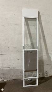 lot 311 image: PetSafe 1-Piece White Adjustable Height 91 716 to 96 inch Sliding Glass Pet Door