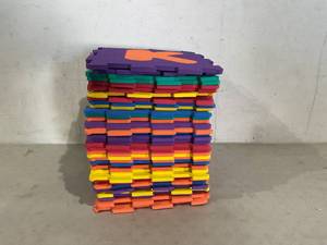 lot 520 image: LOT OF 36 Interlocking Alphabet Foam Floor Tiles