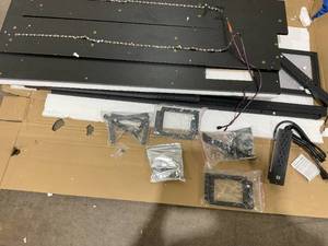 lot 82 image: SUPERJARE L Shaped Computer Desk with Power Outlets & LED Strips - Black
