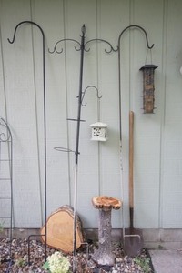 lot 124 image: Lawn and Garden DeCor Shepherd Hooks Bird Feeders Concrete Bird Bath Base Shovel Etc.