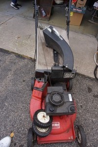 lot 23 image: Lawn Equipment Toro Walk Behind Lawnmower Bagger Spare Tires Etc