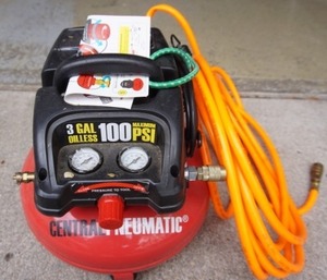 lot 29 image: Garage Air Compressor Central Pneumatic 3 Gallon Oil-Less Pancake