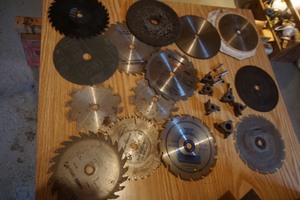 lot 108 image: Tools Circular Saw Blades of Various Sizes Uses and Wood Router Drawer Bits Etc.