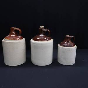 lot 42 image: STONEWARE JUGS  WHISKEY JUGS
