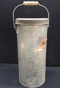 lot 65 image: TALL VINTAGE CAN WITH HANDLE