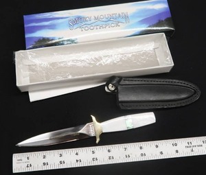 lot 101 image: SMOKEY MOUNTAIN TOOTHPICK WITH LEATHER SHEATH