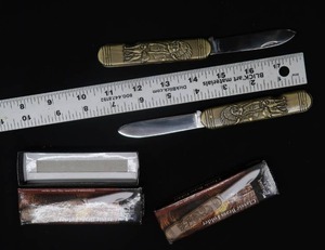 lot 106 image: CLASSIC BRASS FOLDING KNIFE SET OF 2