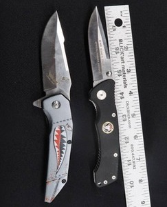 lot 110 image: SET OF 2 FOLDING KNIVES