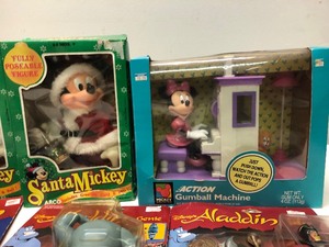 lot 79 image: Group of NIB DIsney Mickey Mouse & Aladdin Toys